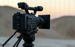 Film camera on a tripod on location